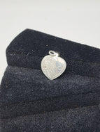 Heart shaped Hummingbird pendant by Ivan Wilson