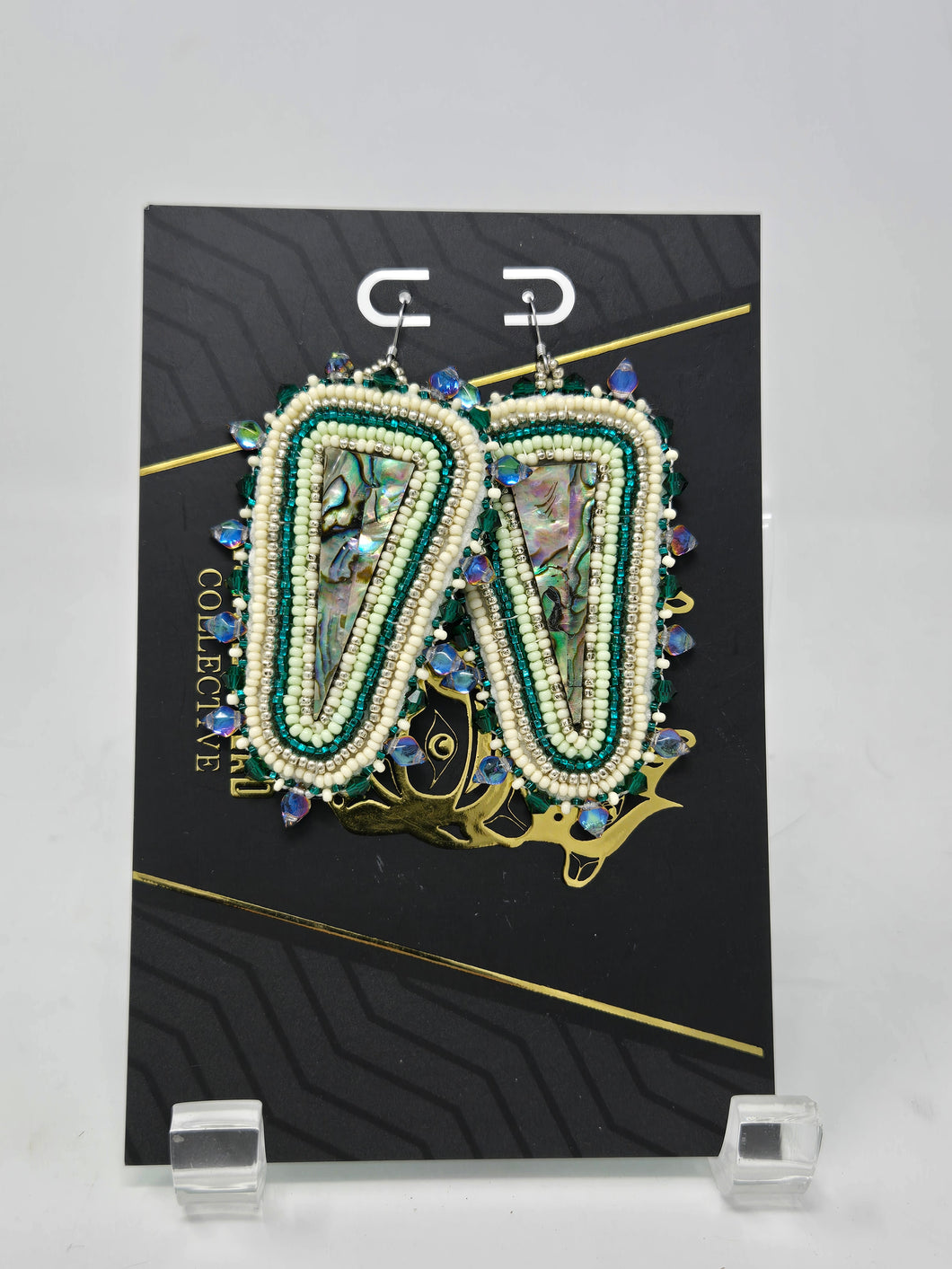 Triangle abalone dangles by Jenna Lancaster