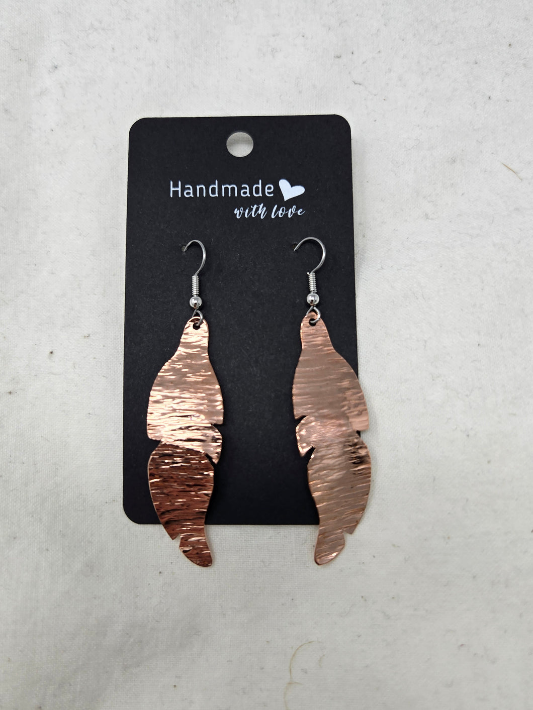 Copper feather earrings by Valerie Lancaster