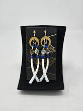 Load image into Gallery viewer, Star and moon dangles by Brandi Lancaster
